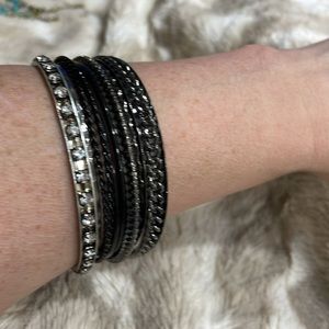 Set of dark colored bracelets (9)